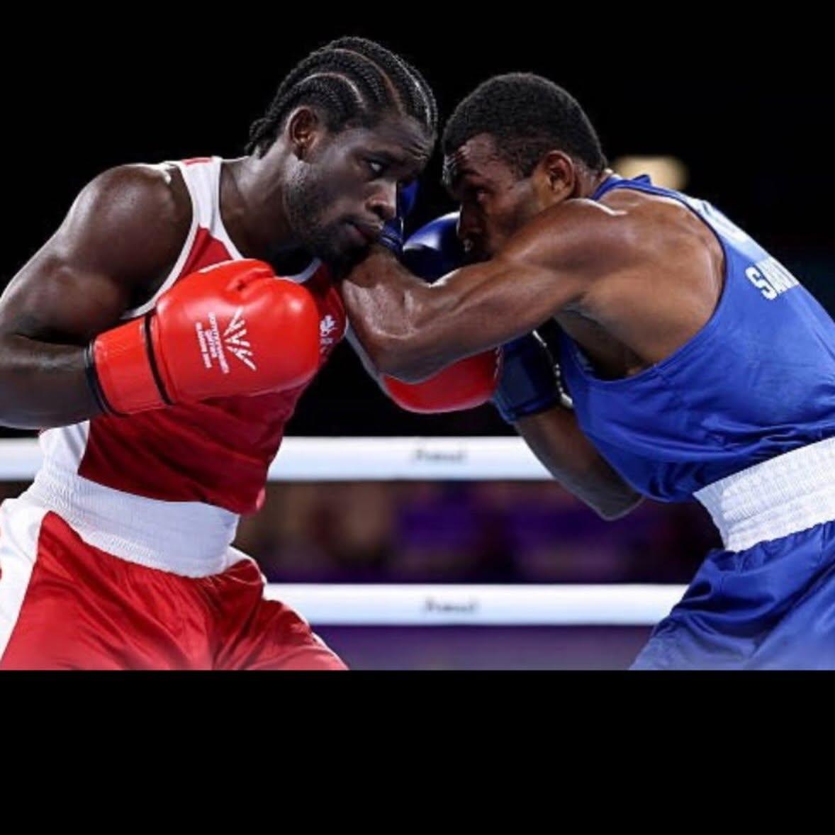 Two Marshall Boxing boxers competing in the ring